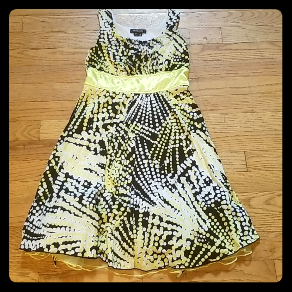 A black and yellow beautifully spotted dress